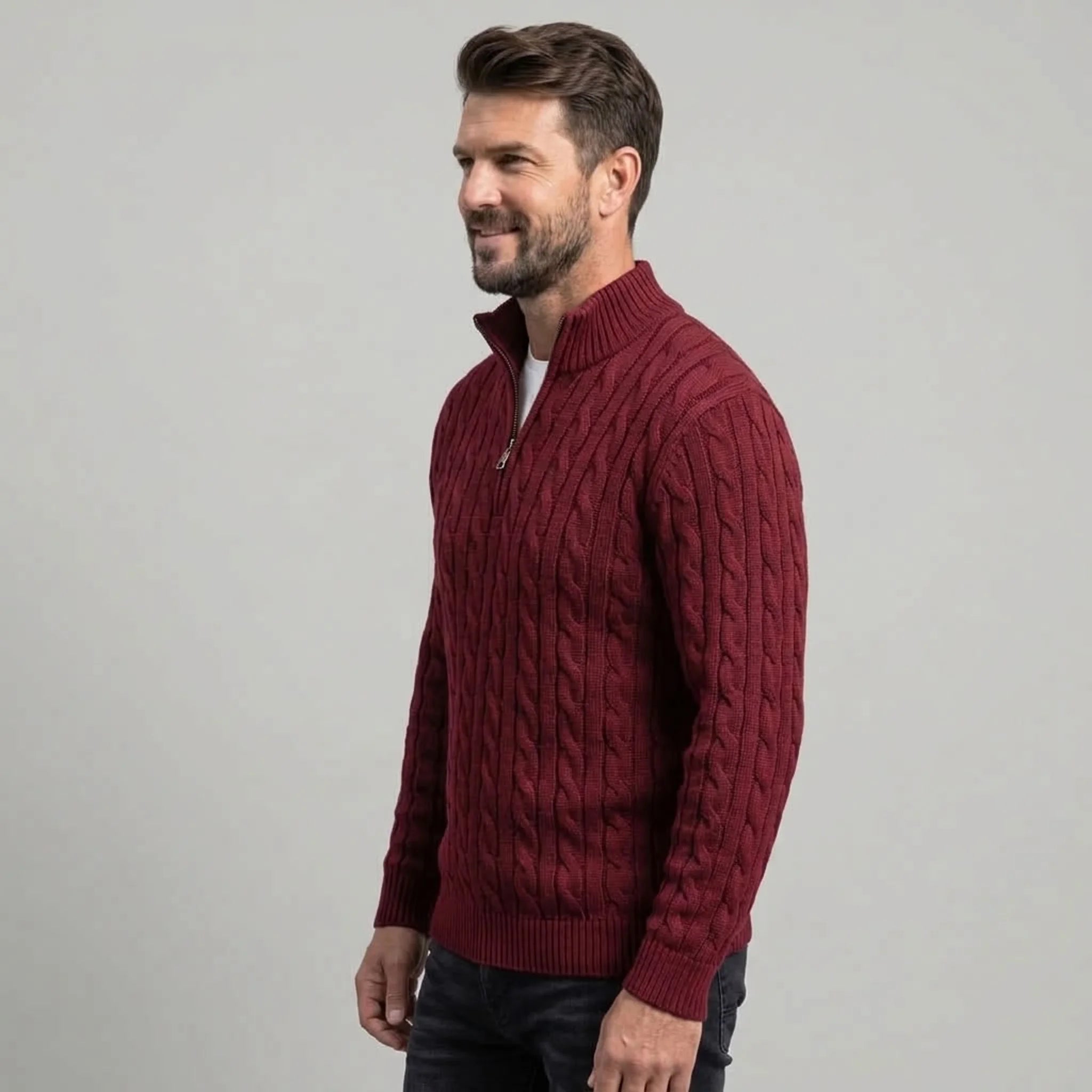 Burgundy cable knit quarter-zip sweater on model, side view