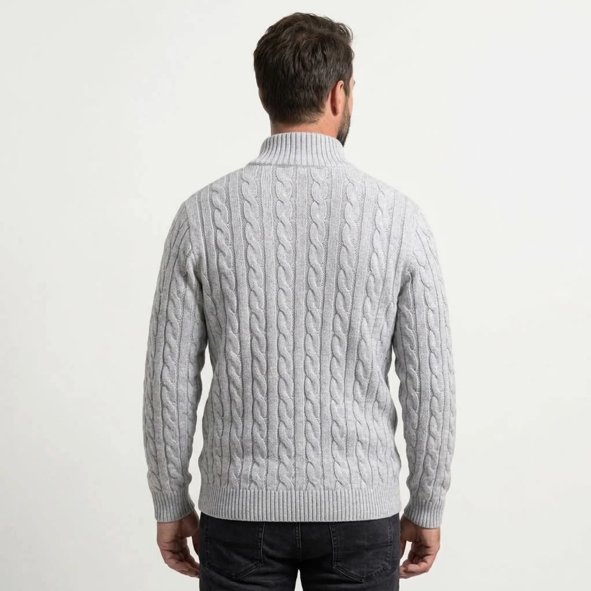 Light grey cable knit quarter-zip sweater on model, back view