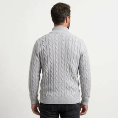 Light grey cable knit quarter-zip sweater on model, back view