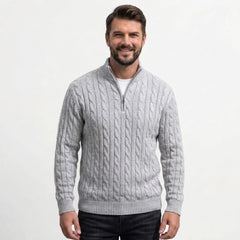 Light grey cable knit quarter-zip sweater on model, front view