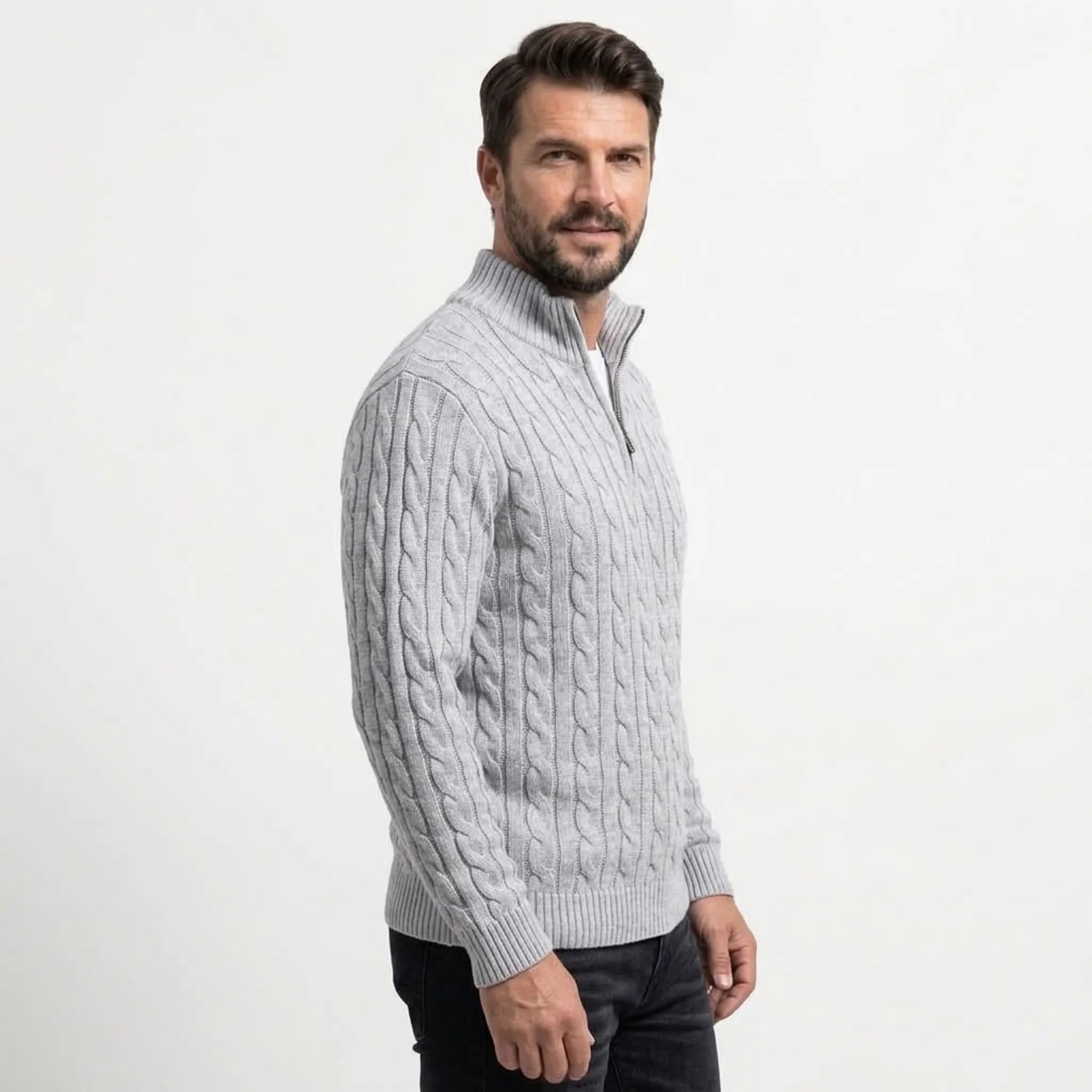 Light grey cable knit quarter-zip sweater on model, side view