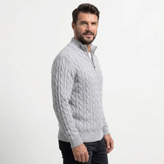 Light grey cable knit quarter-zip sweater on model, side view