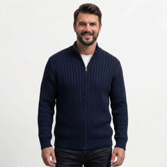Navy cable knit zip sweater on model, front view