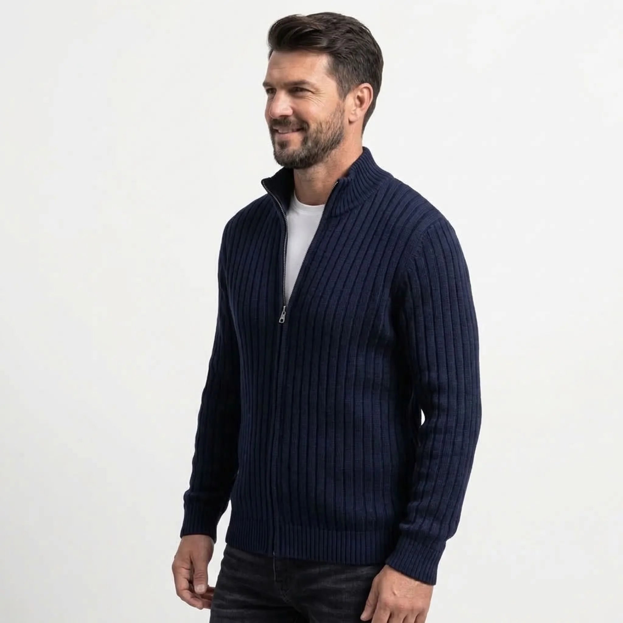 Navy cable knit zip sweater on model, side view
