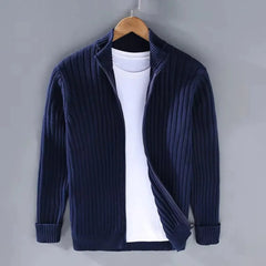 Navy cable knit full-zip sweater, front view on hanger