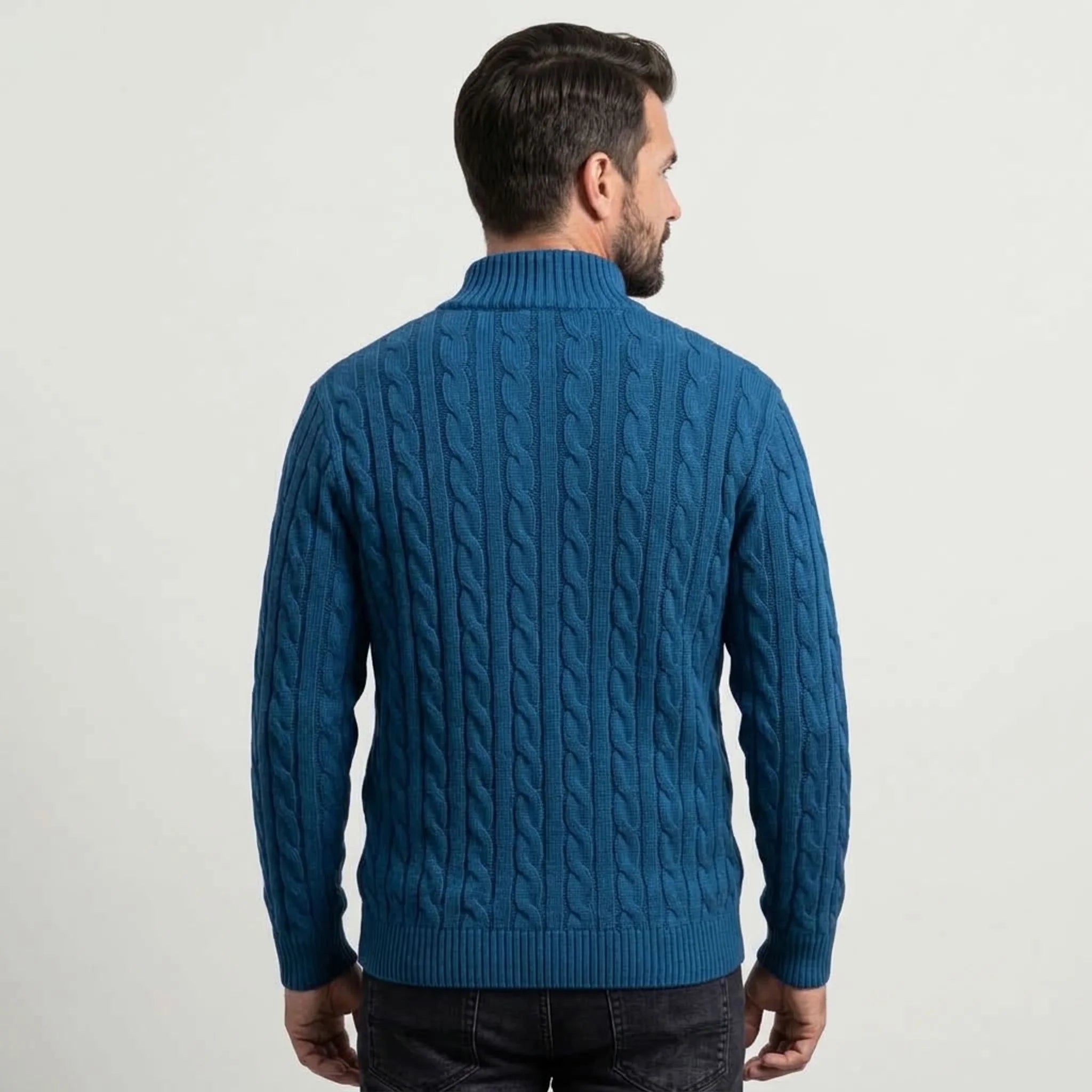 Teal blue cable knit quarter-zip sweater on model, back view