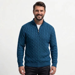 Teal blue cable knit quarter-zip sweater on model, front view