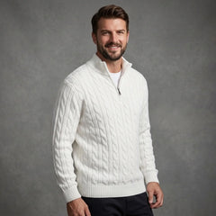 White cable knit quarter-zip sweater worn with dark trousers, front view