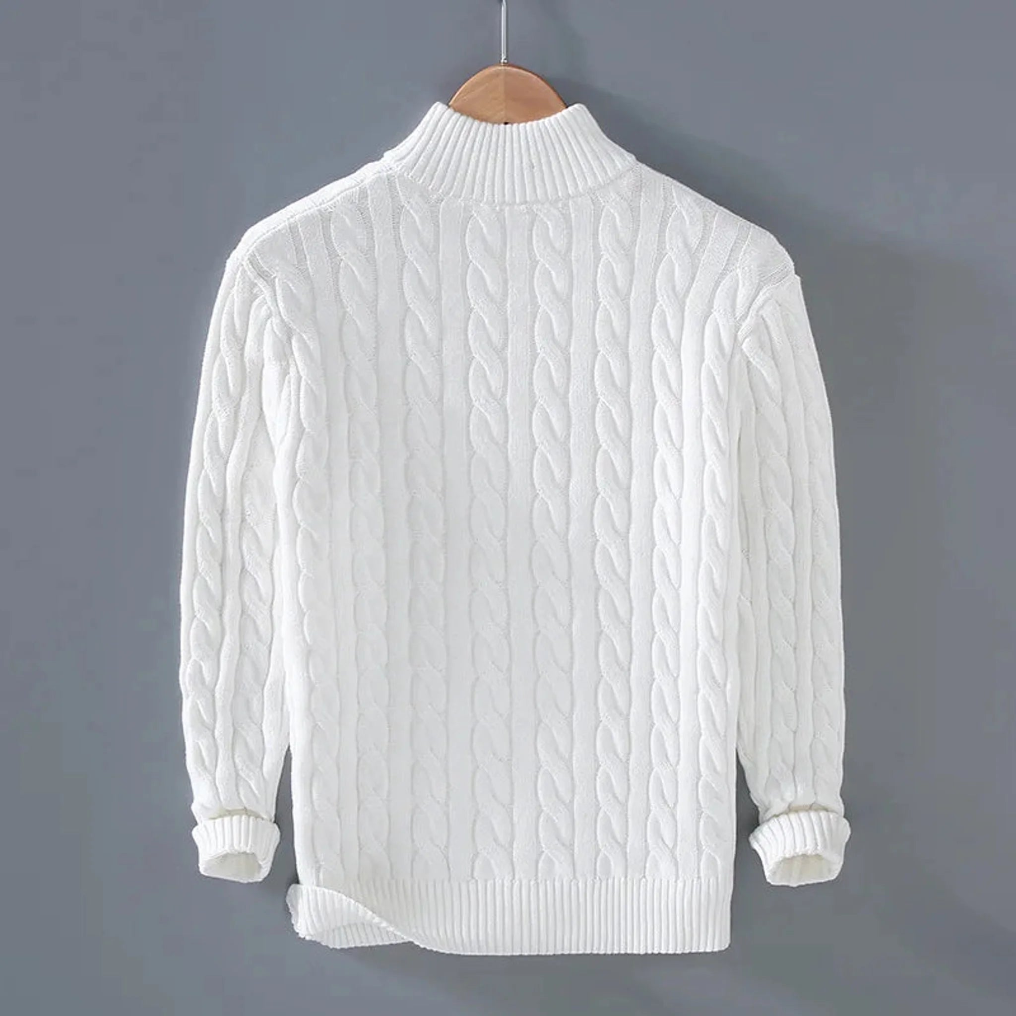 White cable knit quarter-zip sweater, back view on hanger