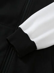 White hoodie sleeve with black ribbed cuff, close-up