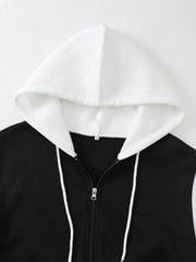 White hood with drawstrings and black full-zip front, close-up