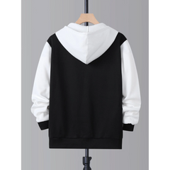 Black and white zip-up hoodie, back view on hanger