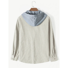 Beige corduroy hooded overshirt on a hanger, back