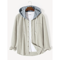 Beige corduroy hooded overshirt on a hanger, front