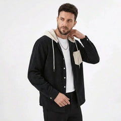 Black corduroy hooded shirt jacket, model front pose