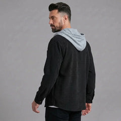 Black corduroy hooded shirt jacket, side back view with hood