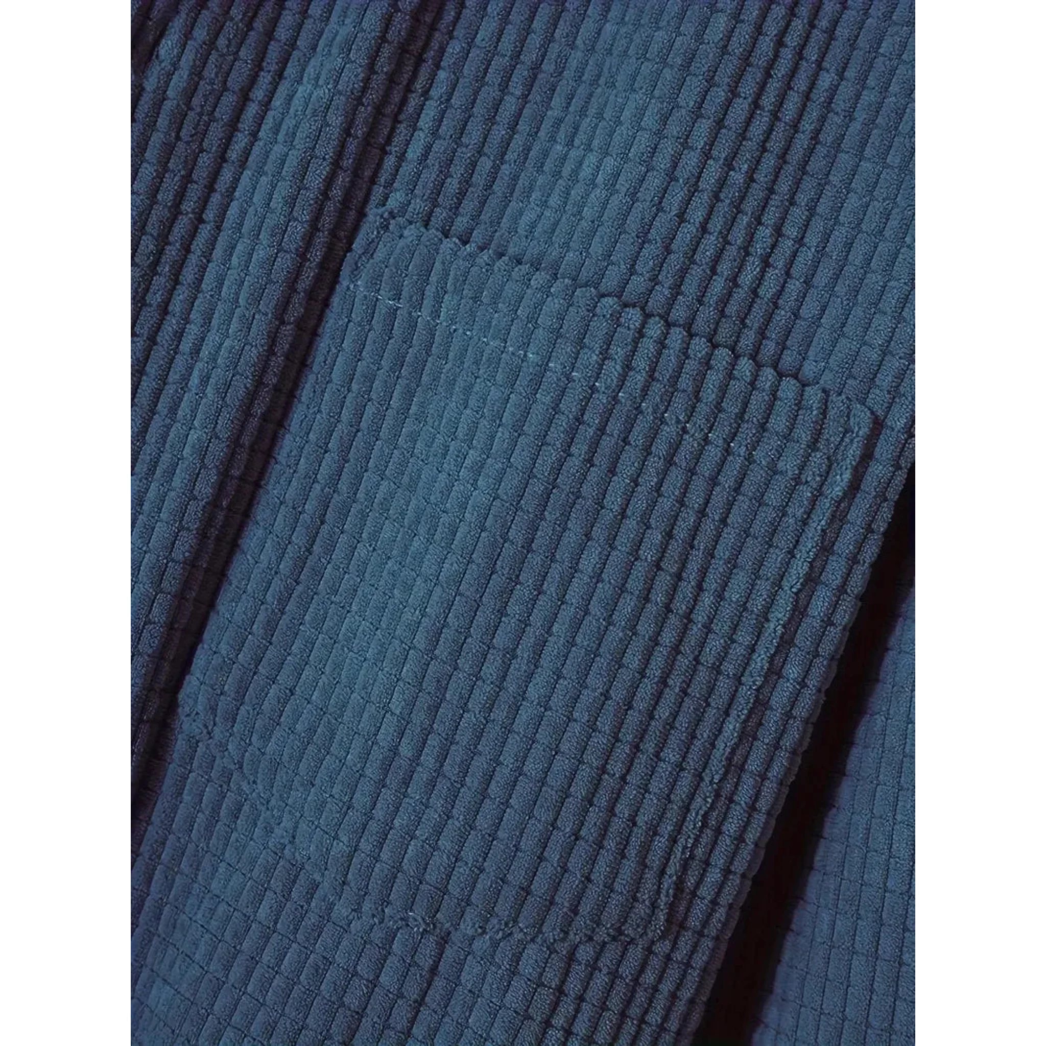 Close-up of blue corduroy fabric texture