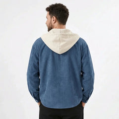 Denim blue corduroy hooded shirt jacket with cream hood, model back view