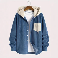 Denim blue corduroy hooded shirt jacket with cream hood and chest pocket, product front view