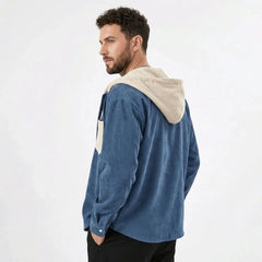 Denim blue corduroy hooded shirt jacket, model side view
