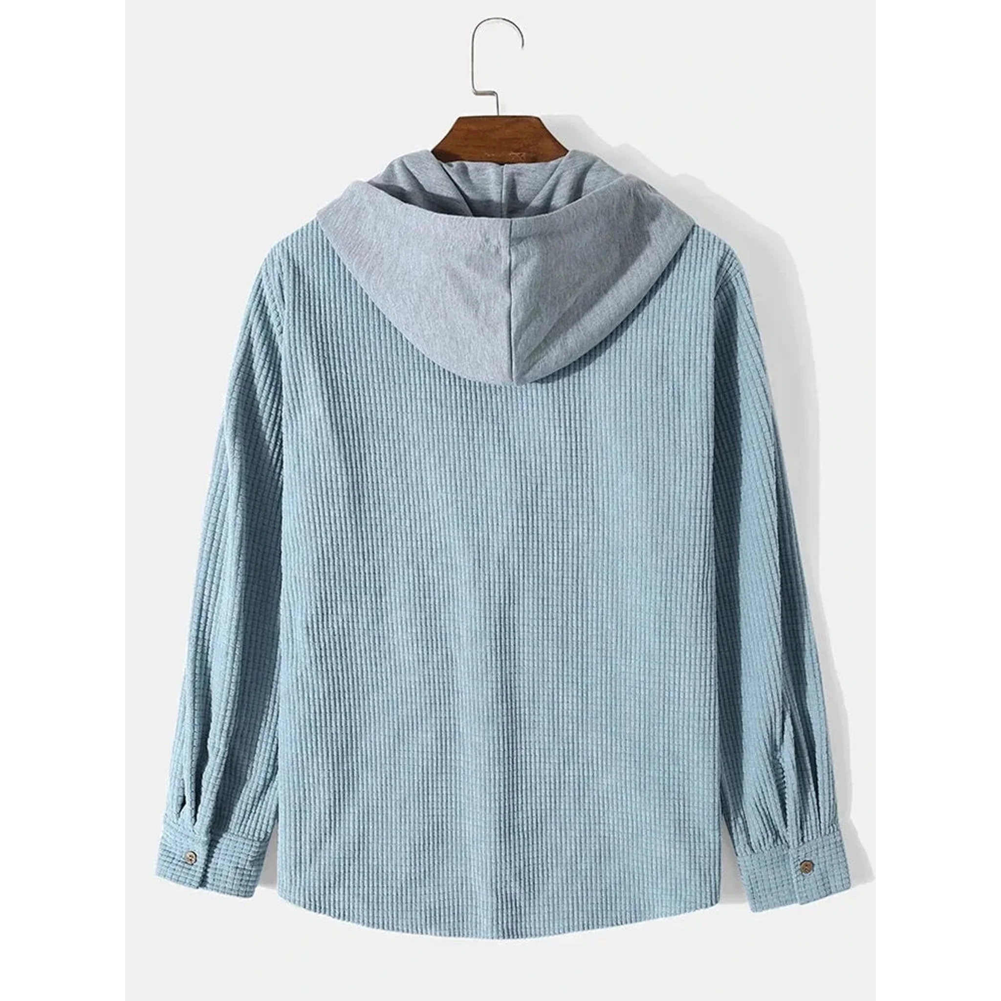 Light blue corduroy hooded overshirt on a hanger, back