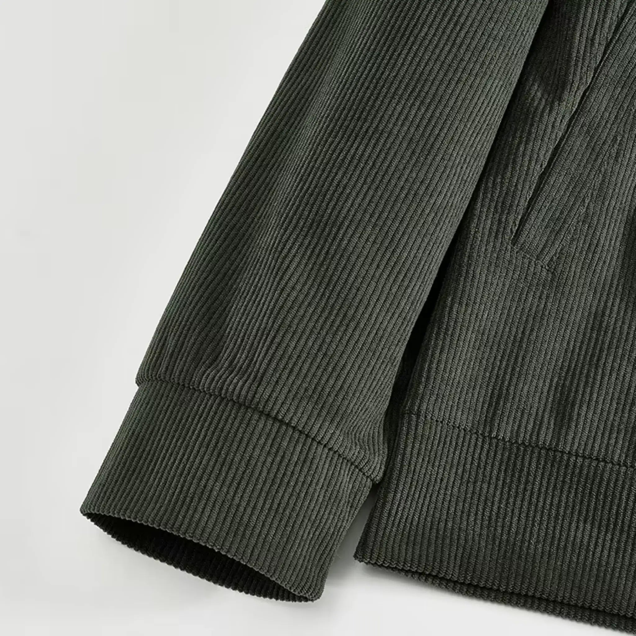Army green corduroy jacket close-up of sleeve cuff