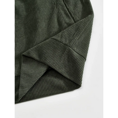 Army green corduroy jacket close-up of hem and side seam