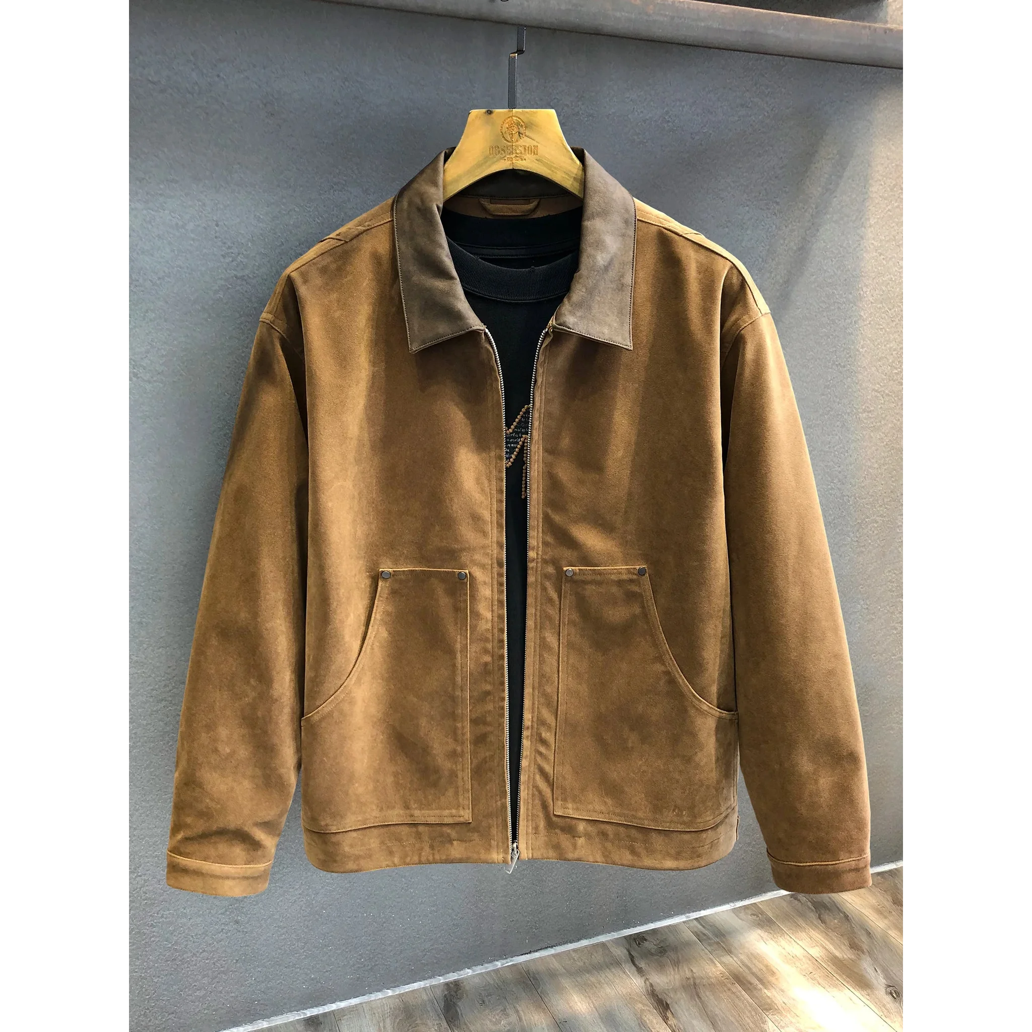 Camel faux suede zip jacket with dark contrast collar, front view on hanger
