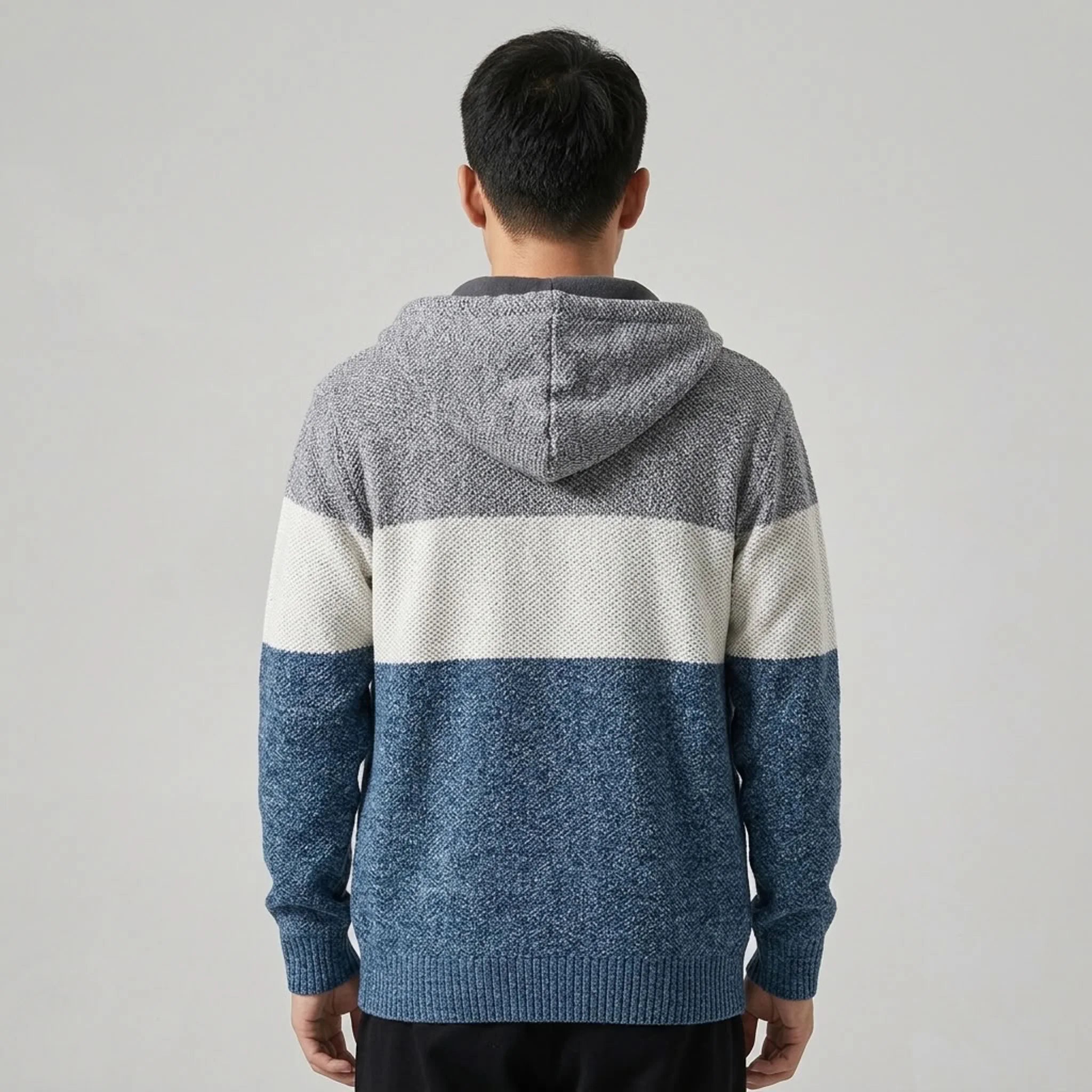Denim blue fleece-lined knit zip hoodie, back view on model