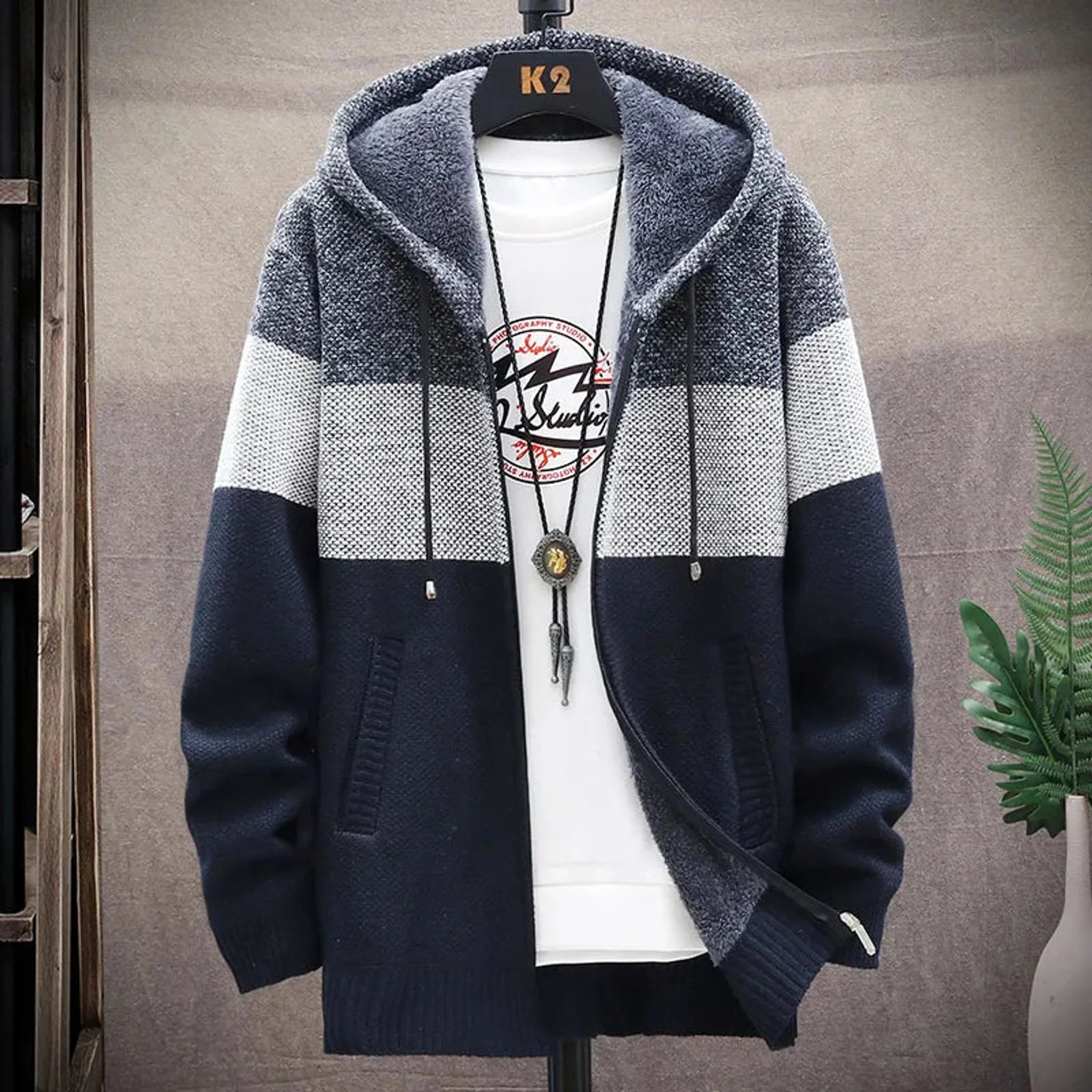 Navy three-tone knit zip hoodie on a mannequin, front, unzipped
