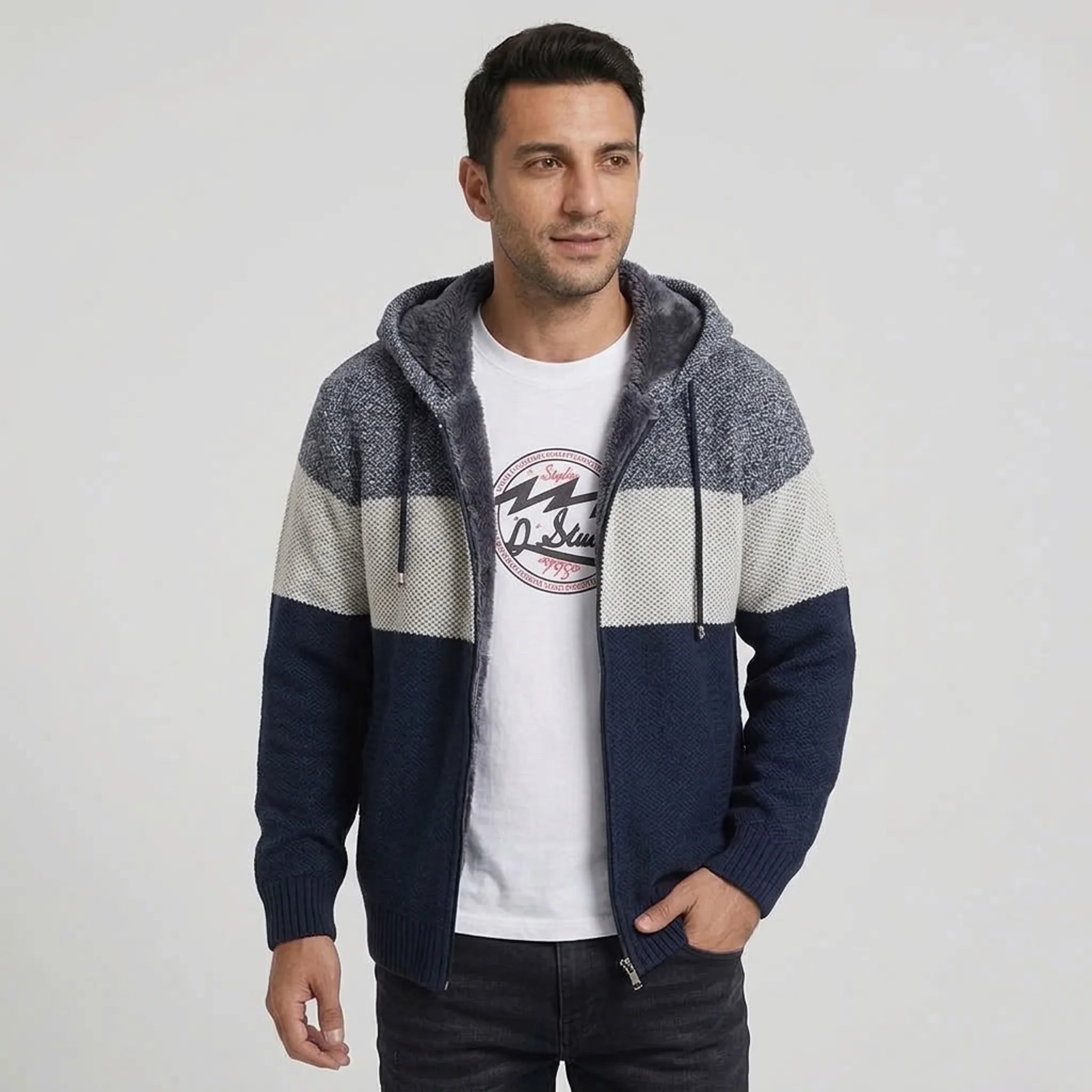Man wearing navy color-block fleece-lined knit zip hoodie, front view