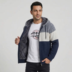 Navy knit zip hoodie held open to show the plush fleece lining