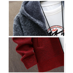Close-up of the fleece-lined hood and ribbed cuff on the wine red knit hoodie