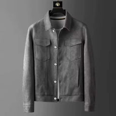 Gray suede-look trucker jacket on a hanger, front view with chest flap pockets and buttons