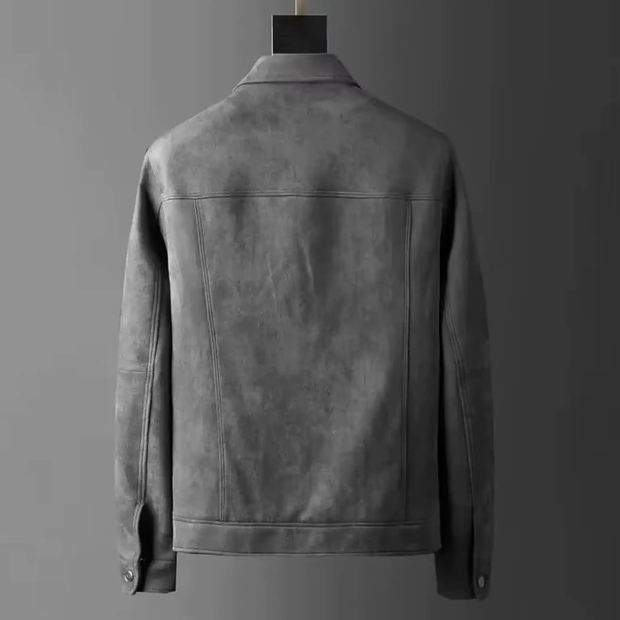 Gray suede-look trucker jacket on a hanger, back view