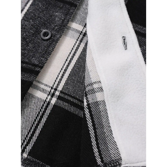 Black plaid shirt jacket fleece lining and snap button close-up