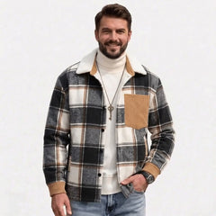 Man wearing black plaid fleece-lined shirt jacket, front view