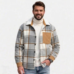 MannerCo men's light grey plaid fleece-lined shirt jacket with corduroy trim, front view on model