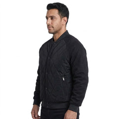 Black quilted bomber jacket on model, side view