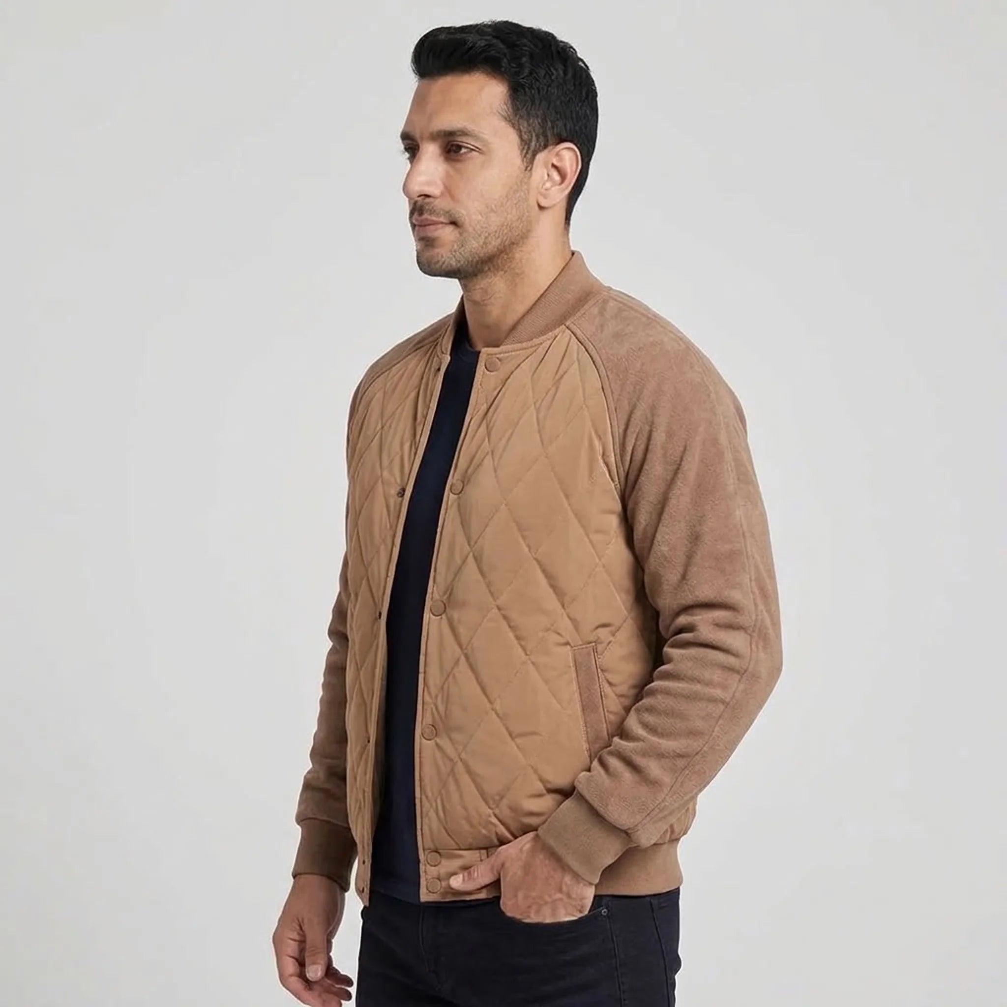 Camel quilted bomber jacket on model, side view