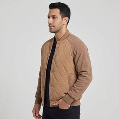 Camel quilted bomber jacket on model, side view