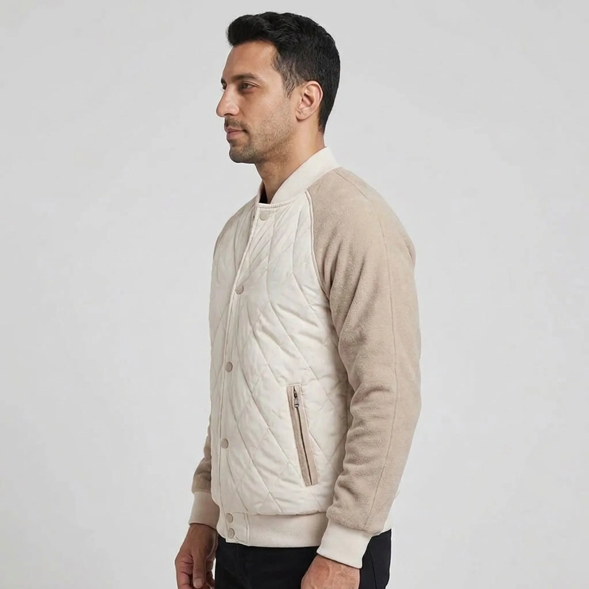 Cream quilted bomber jacket on model, side view