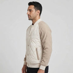 Cream quilted bomber jacket on model, side view