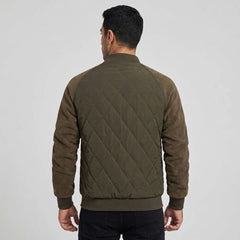 Olive quilted bomber jacket on model, back view