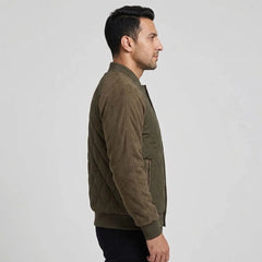 Olive quilted bomber jacket on model, side view