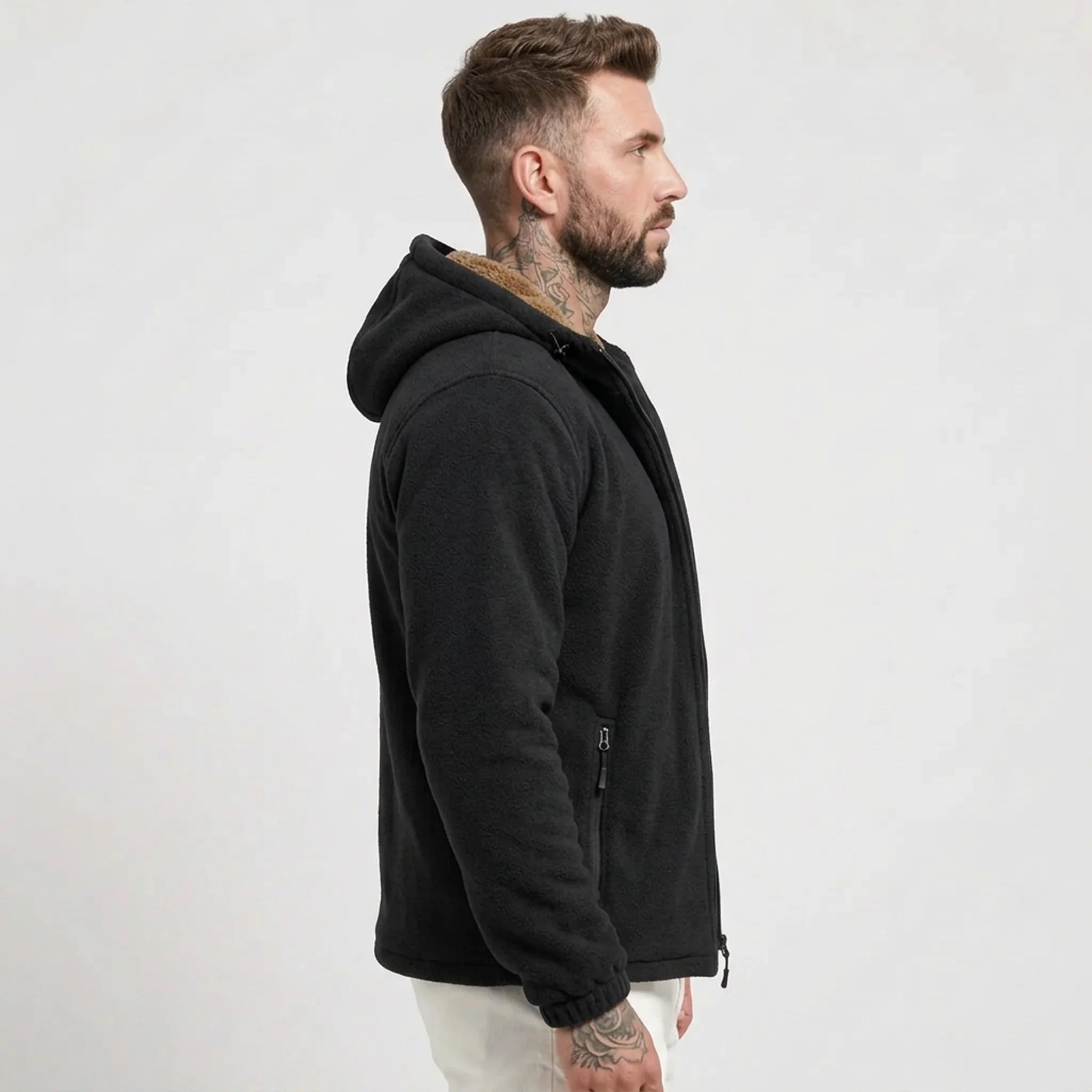 Black sherpa-lined fleece jacket on model, side view