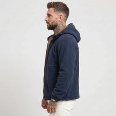 Navy sherpa-lined fleece jacket on model, side view