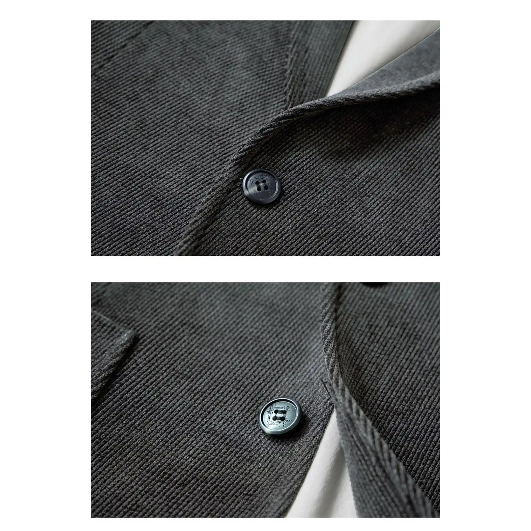 Close-up of black blazer front button