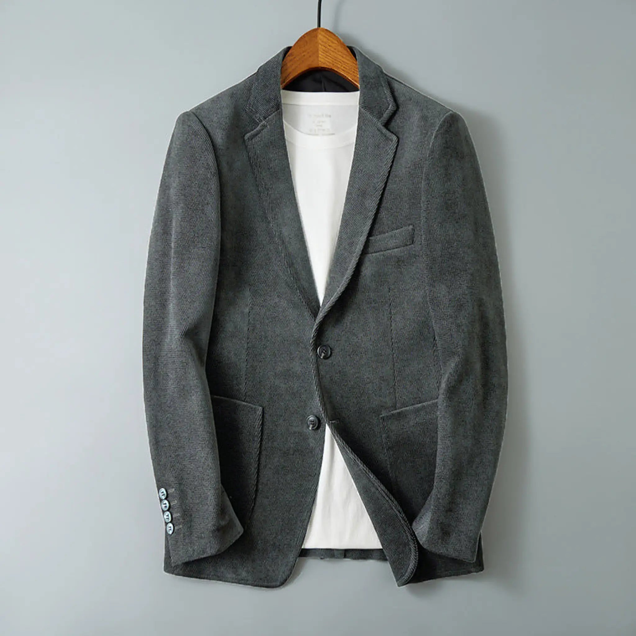 Gray brushed twill blazer on a hanger, front view with notch lapel