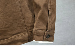Brown denim jacket buttoned cuff detail